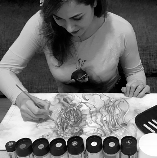 Faezeh Moteabbed hand-painting on fabric for Mahmani Painting project.